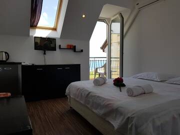 Фото номера Двухместный номер с 1 кроватью с видом на море Гостевой дом Sunny Island Obzor г. Обзор 5