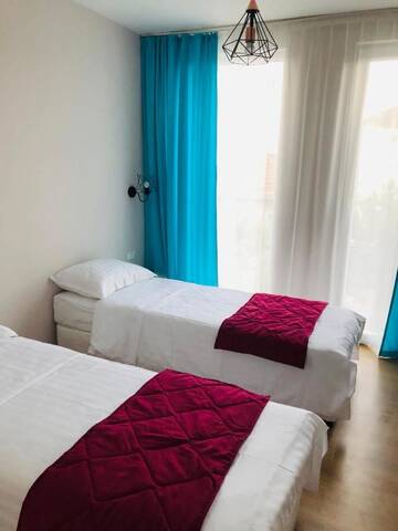 Фото номера Двухместный номер с 2 отдельными кроватями Гостевой дом Colors Boutique Guest House г. Обзор 4