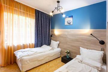 Фото номера Двухместный номер с 2 отдельными кроватями Отель Family Hotel Jemelly г. Обзор 4