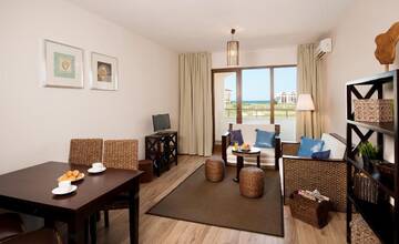 Фото номера Апартаменты с 1 спальней и балконом Апарт-отели Sunrise All Suites Resort- All Inclusive г. Обзор 6